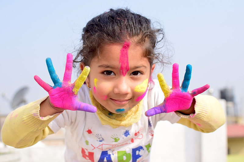 A child celebrating Holi