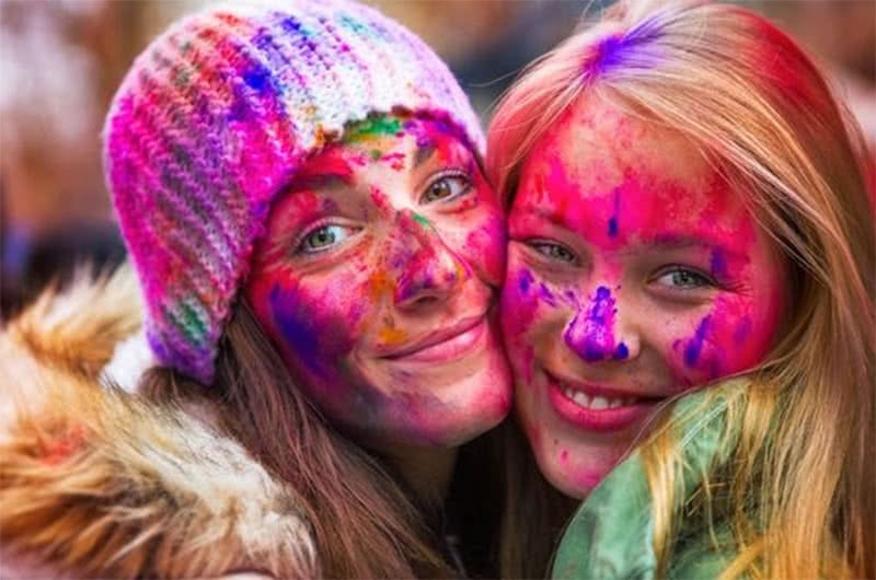 Tourists celebrating Holi