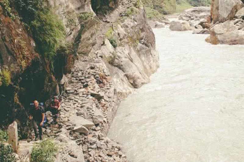 Trekkers on the Trail beside the Marshyangdi River 1