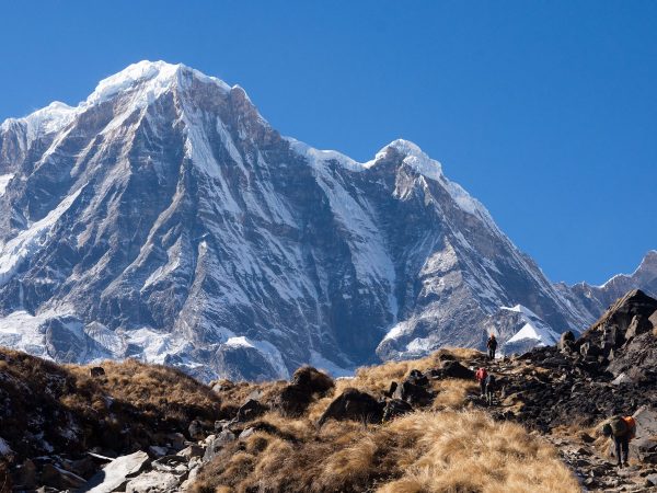 Majestic Annapurna South rises as trekkers approach Annapurna Base Camp