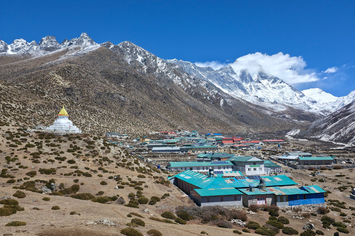 Beautiful view of Dingboche with guesthouses and Mount Lhotse in the background Beautiful view of Dingboche with guesthouses and Mount Lhotse in the background