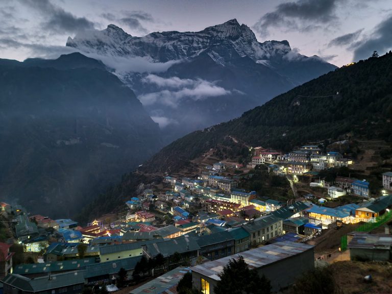 The peaceful evening glow of Namche Bazaar beneath Kongde Ri’s majestic peak.