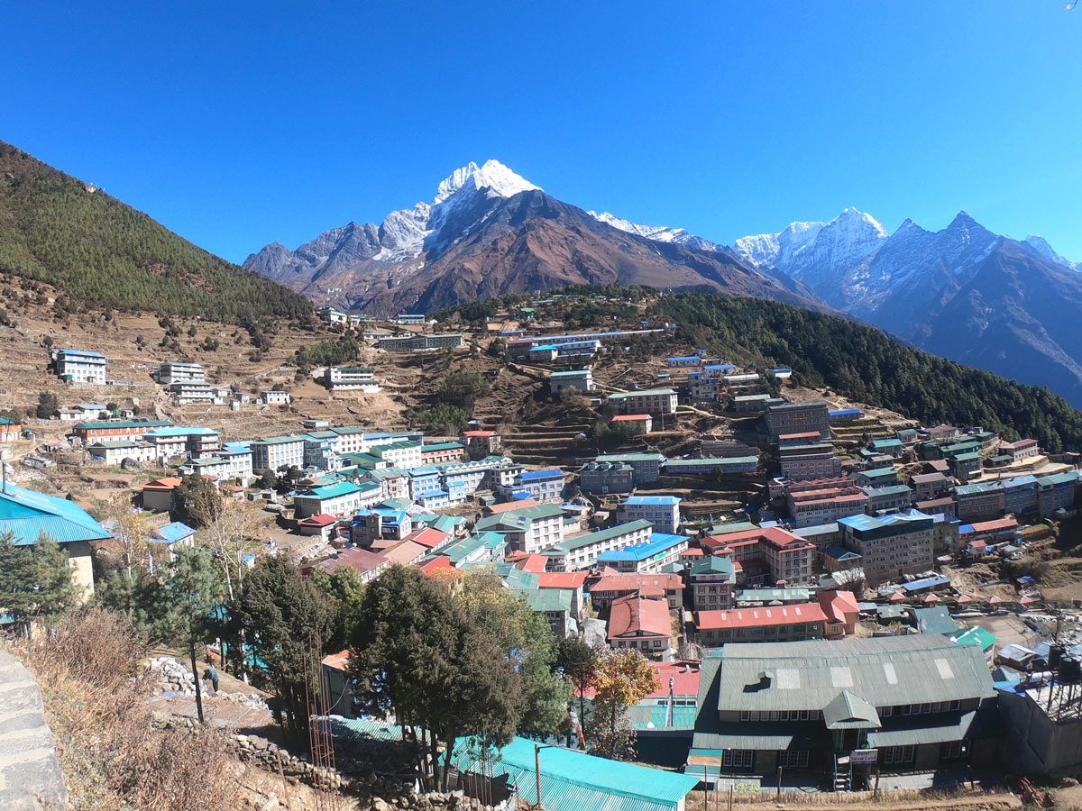 Everest Base Camp Elevation Gain: Complete Altitude Guide for the EBC Trek 5 Wide angle view of Namche Bazaar on a clear day