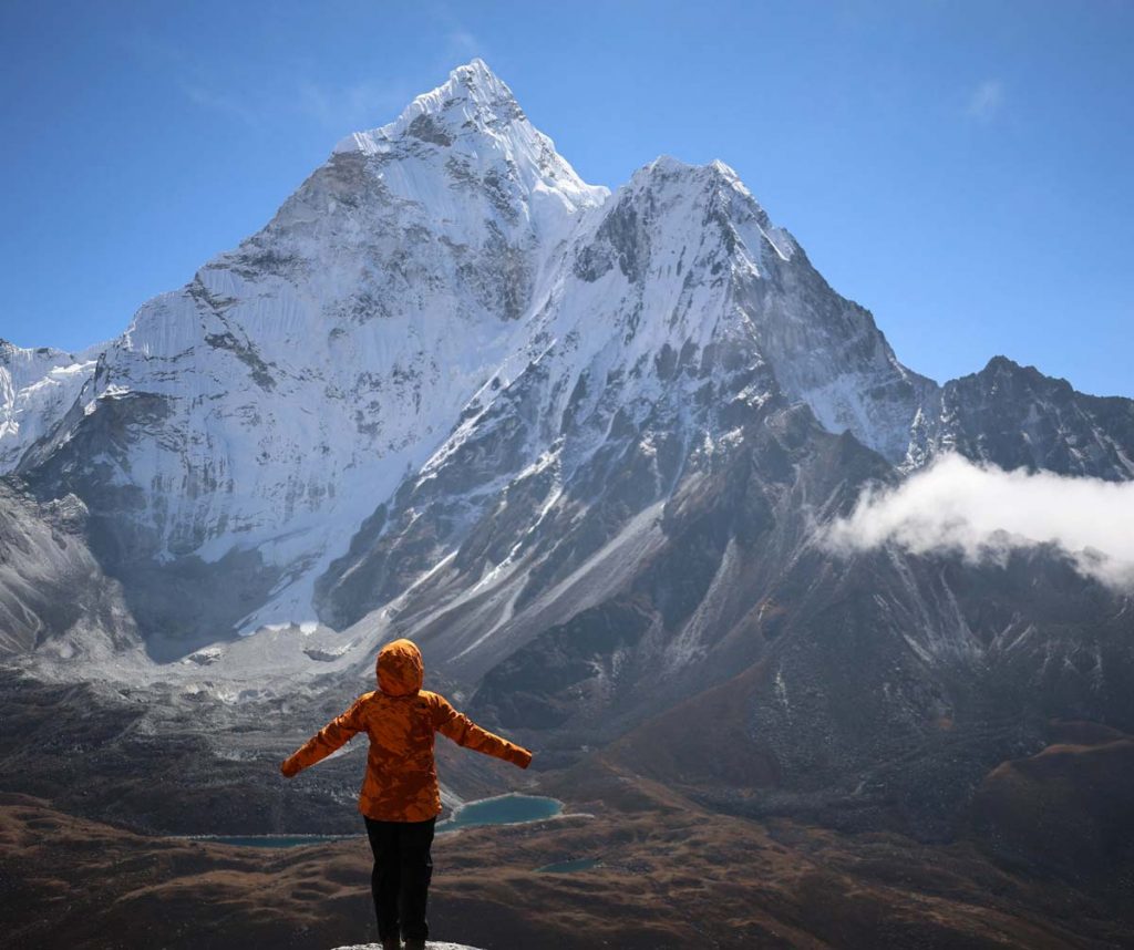 Is Everest Base Camp Trek worth it? 7 A trekker standing in front of Mt. Amadablam during acclimatization hike to Nangkartsang peak
