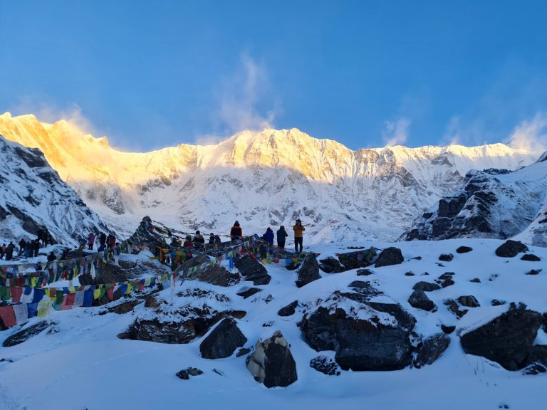 The Annapurna Base Camp trek rewards early risers with a golden Himalayan sunrise.