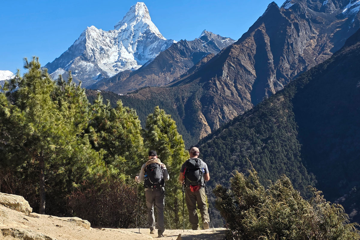A scenic trail to Tengboche with mountain views of Ama Dablam A scenic trail to Tengboche with mountain views of Ama Dablam