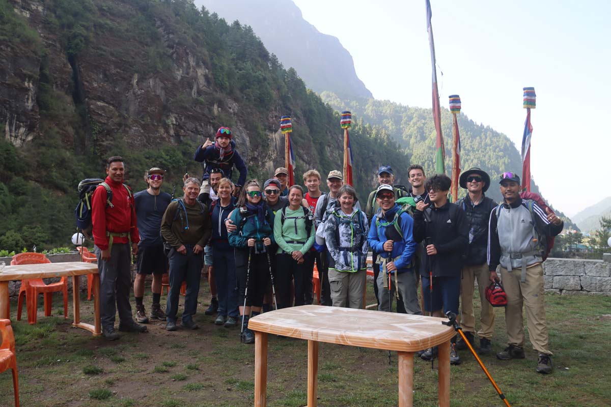 A group snap at a teahouse in Phakding