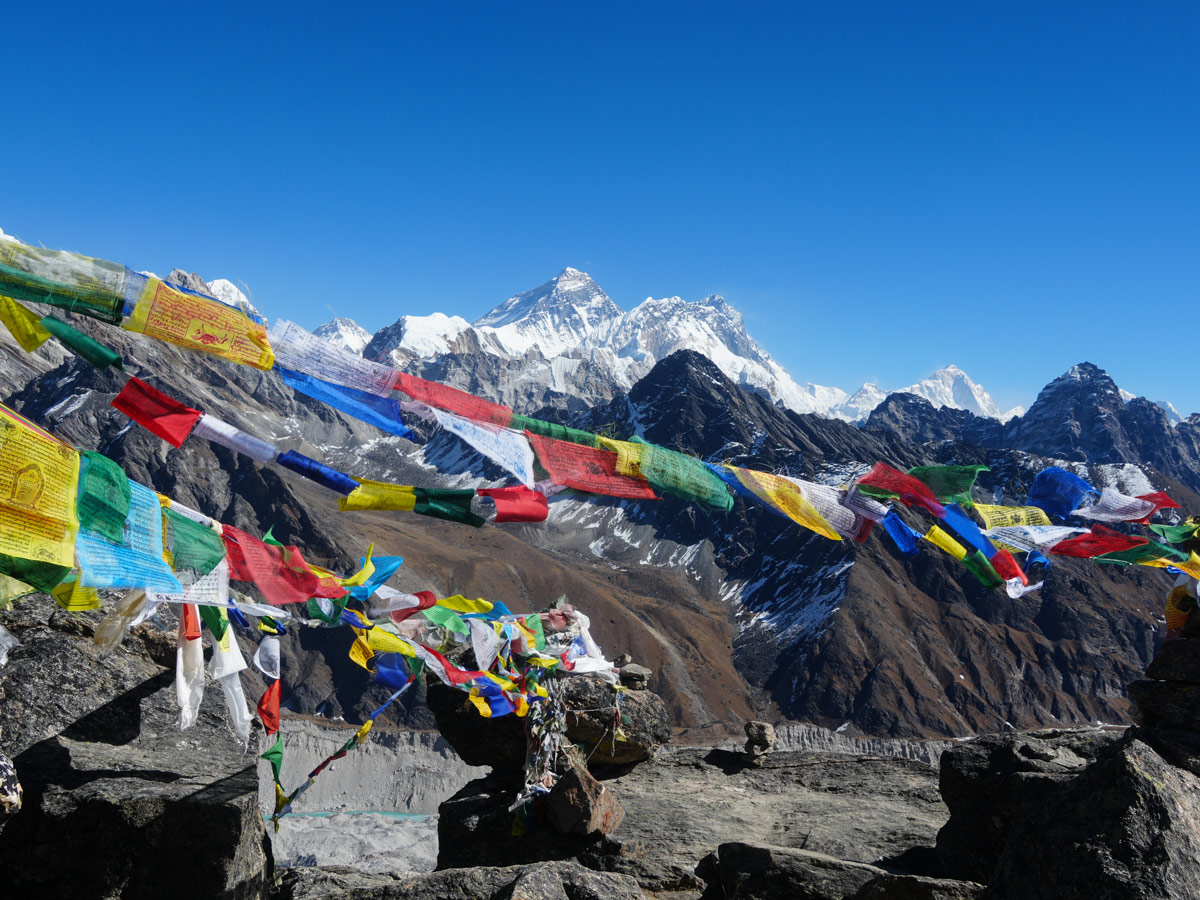 View of Mt. Everest from Gokyo Ri with prayer flags