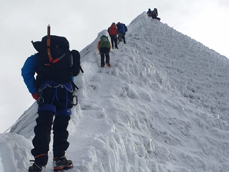 Reaching the summit of Island Peak