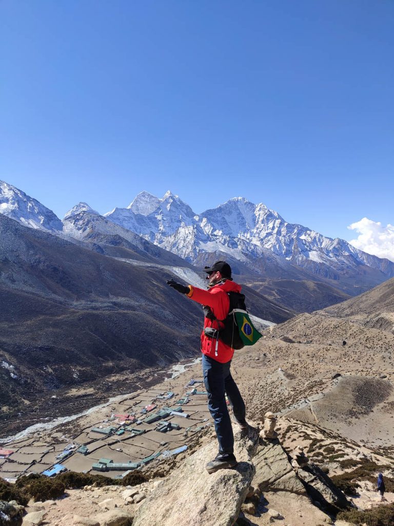 Trekker relaxing on the Dingboche acclimatization hike