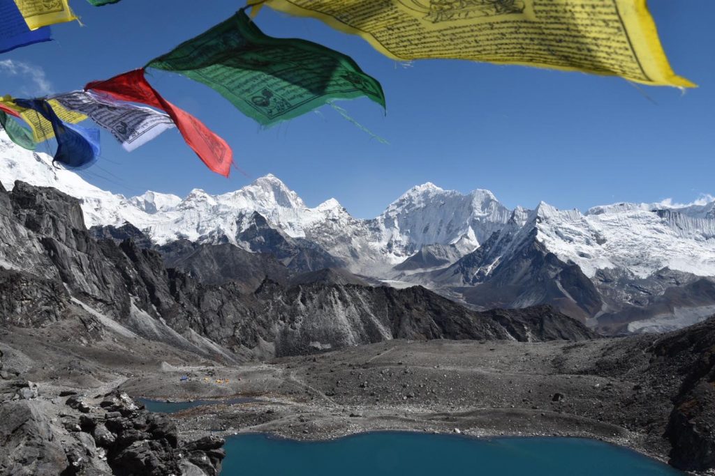 Lobuche: A Crucial Stop on the Everest Base Camp Trail 5 View of Mt Makalu with prayer flags from Kongma la during Everest Three Passes Trek
