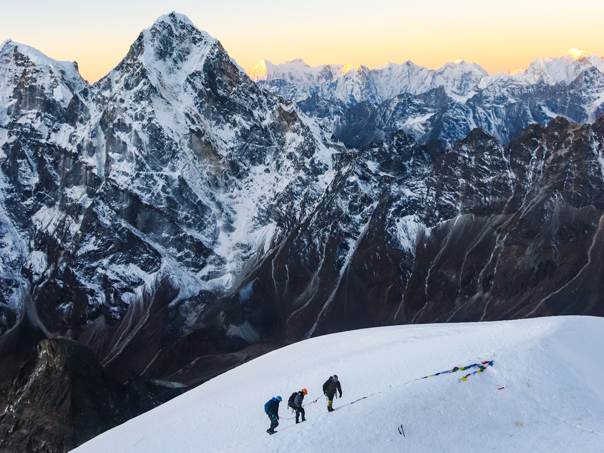 Everything You Need to Know About Mountaineering in Nepal 1 Lobuche East Climbing, standing at the top with pride
