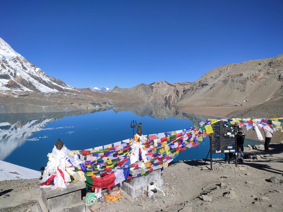 Peace and prayers by the stunning Tilicho Lake