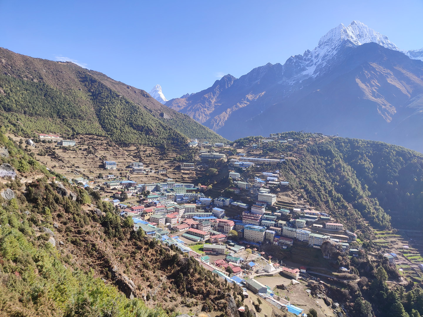 Namche Bazaar on a clear day with mount Thamserku in the background