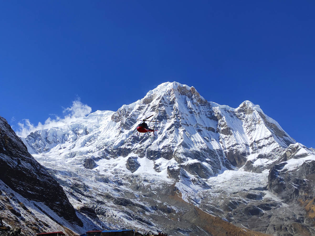 Helicopter with Annapurna South in background