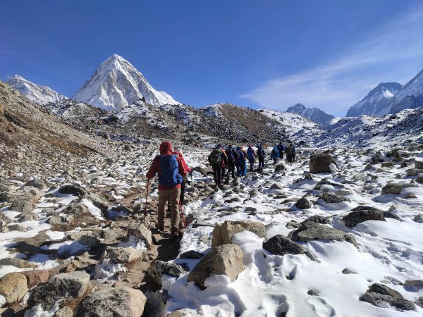 Trekking towards Gorakshep on snowy trail