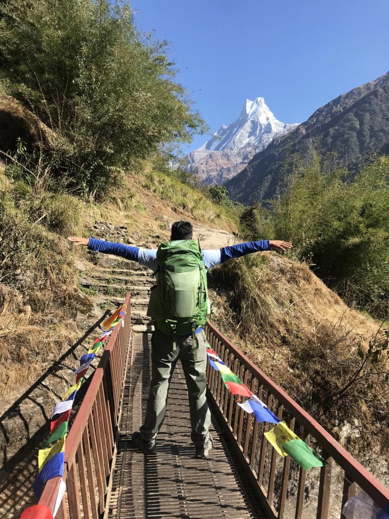 Embracing serenity during the Annapurna base camp trek.