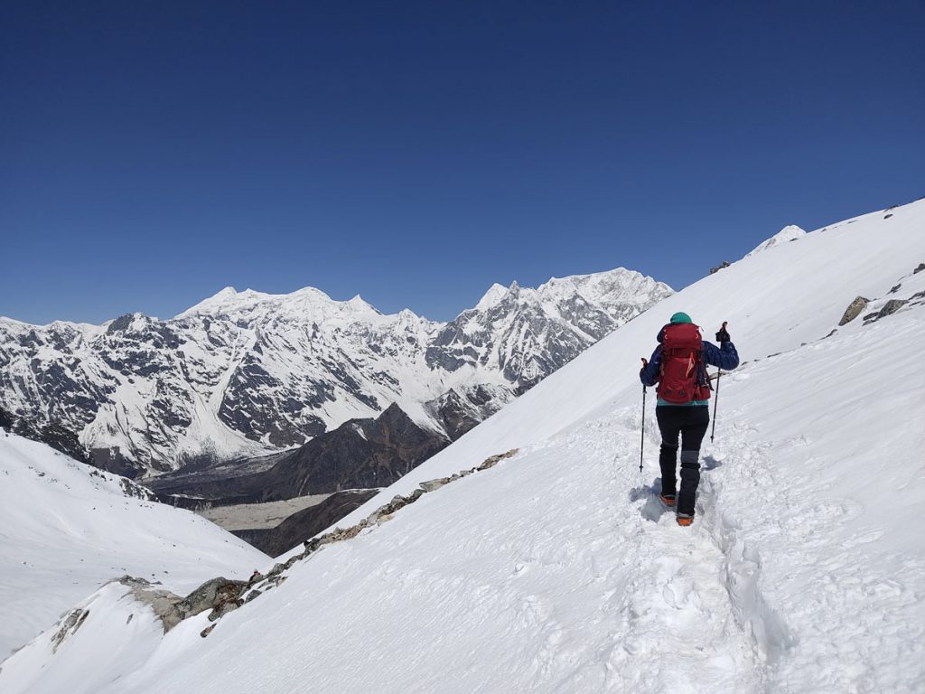 A trekker on the way to Bimthang after crossing Larke La Pass