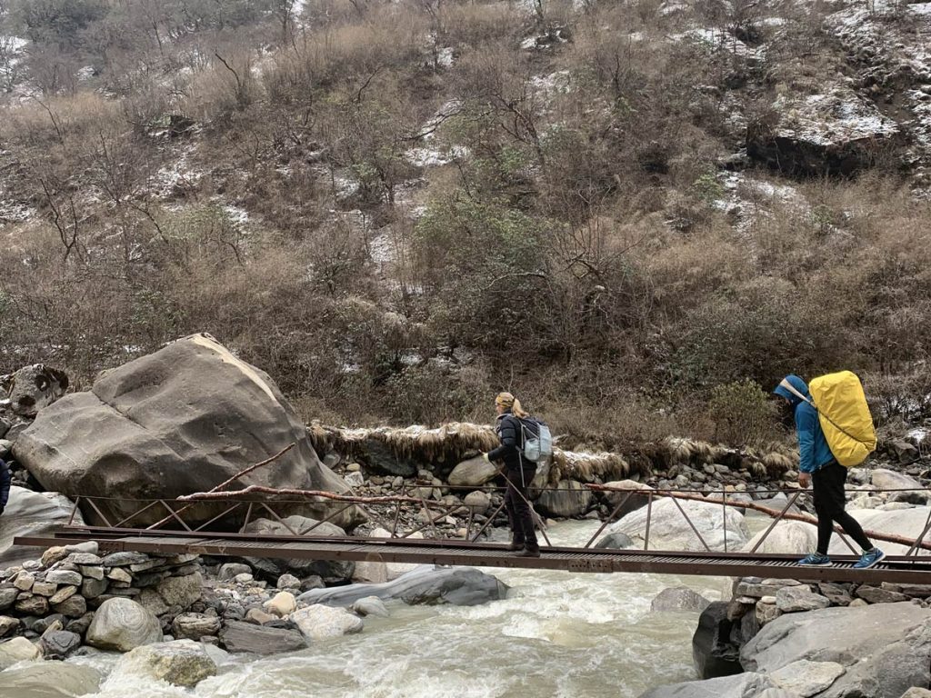 Crossing bridge during ABC trek