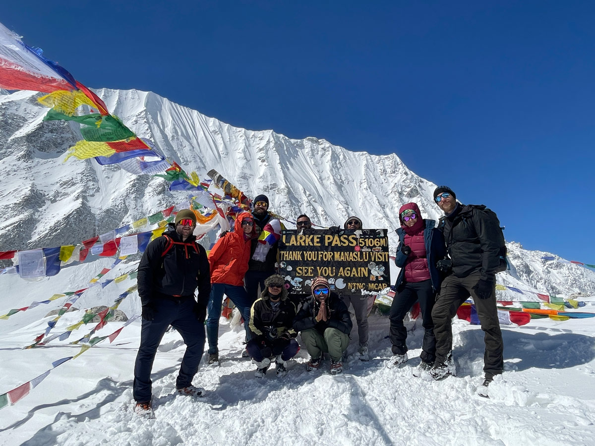 Mountain Passes of Nepal: A Complete Trekking Guide 11 Trekkers at Larkya La Pass, Manaslu Circuit
