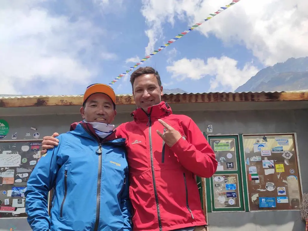 The Life of Sherpas: Guardians of the Himalayas 7 Kami Rita Sherpa (left) holds the record for most ascents to the summit of Mount Everest