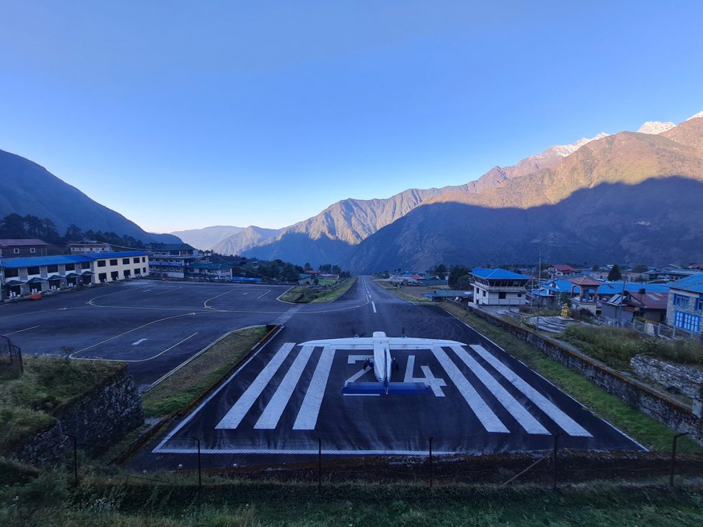 Gokyo vs Tilicho Lake Trek: Which is the Better Lake Trek in Nepal? 5 Airplane taking off from Lukla Airport runway
