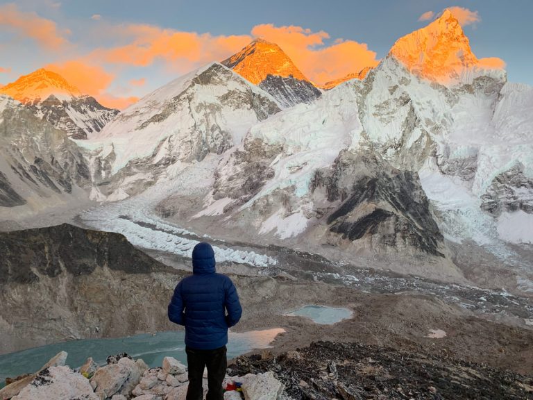 Trekker enjoying the view of Mt. Everest from Kala Patthar