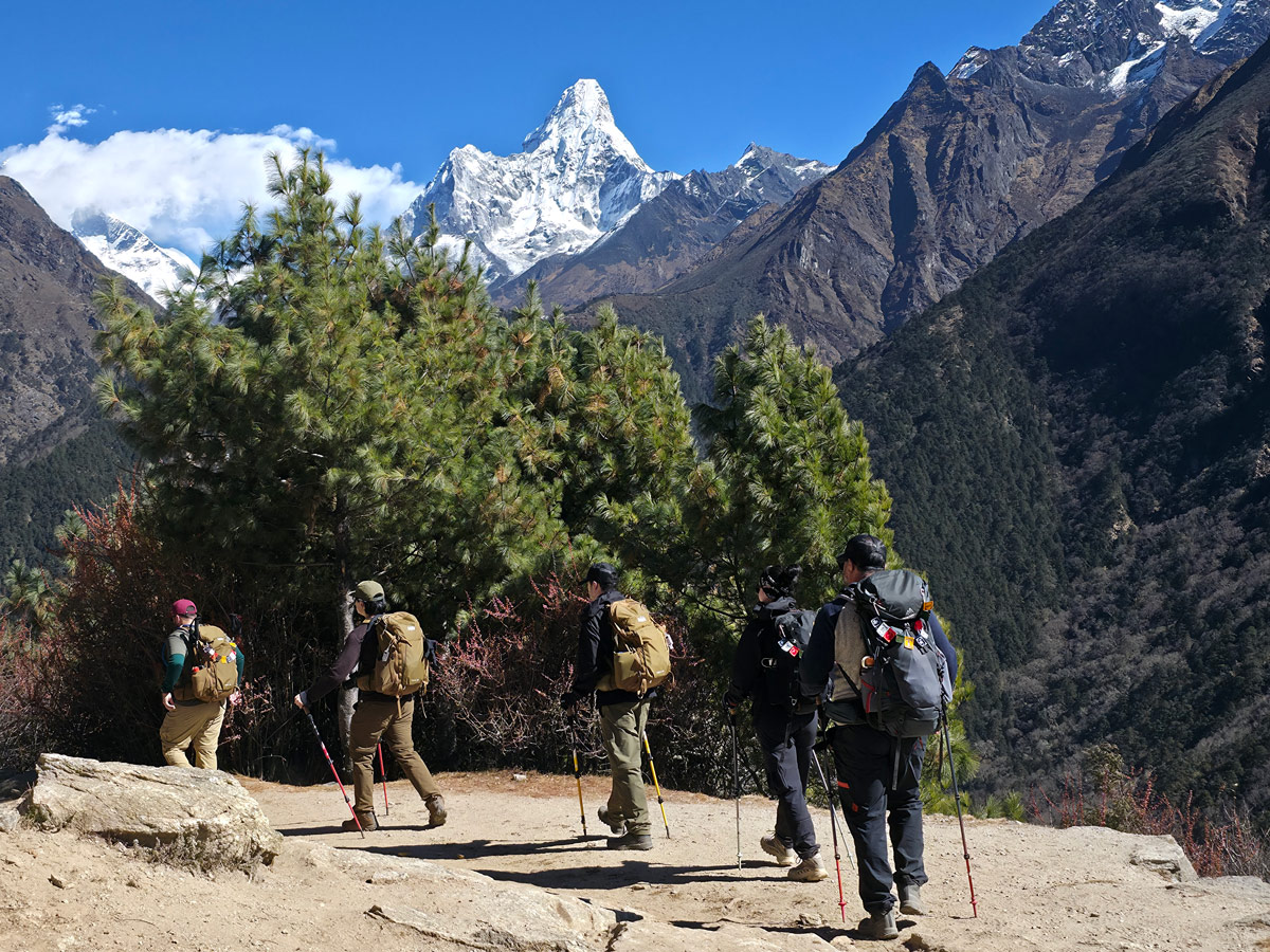 Everest Base Camp Trek Distance Guide: How Far You Walk Each Day 6 Scenic trail to Tengboche with Ama Dablam on the horizon