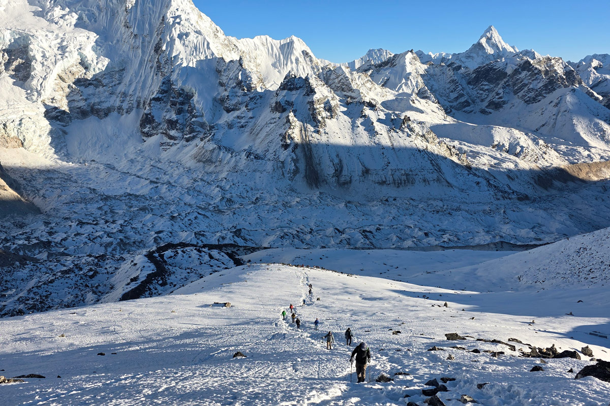 Training Plan for Everest Base Camp Trek 2 Trekkers climbing up the Kala Patthar