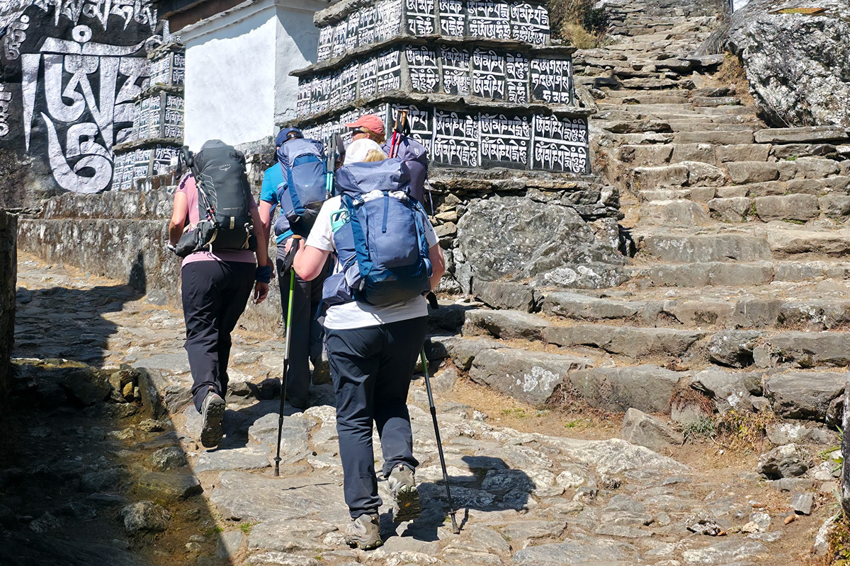 Phakding Village: Your First Stop on the Everest Base Camp Trek 6 Passing ancient mani stone walls on the way to Phakding.