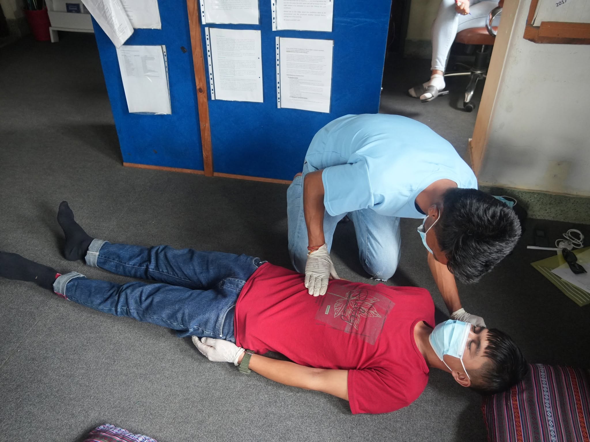 Wilderness First Aid Training at Ace the Himalaya 8 Training for Checking condition of injured trekker